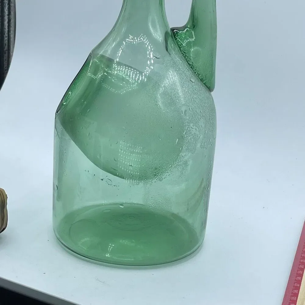 Vintage Italian wine decanter green glass chill without watering down.